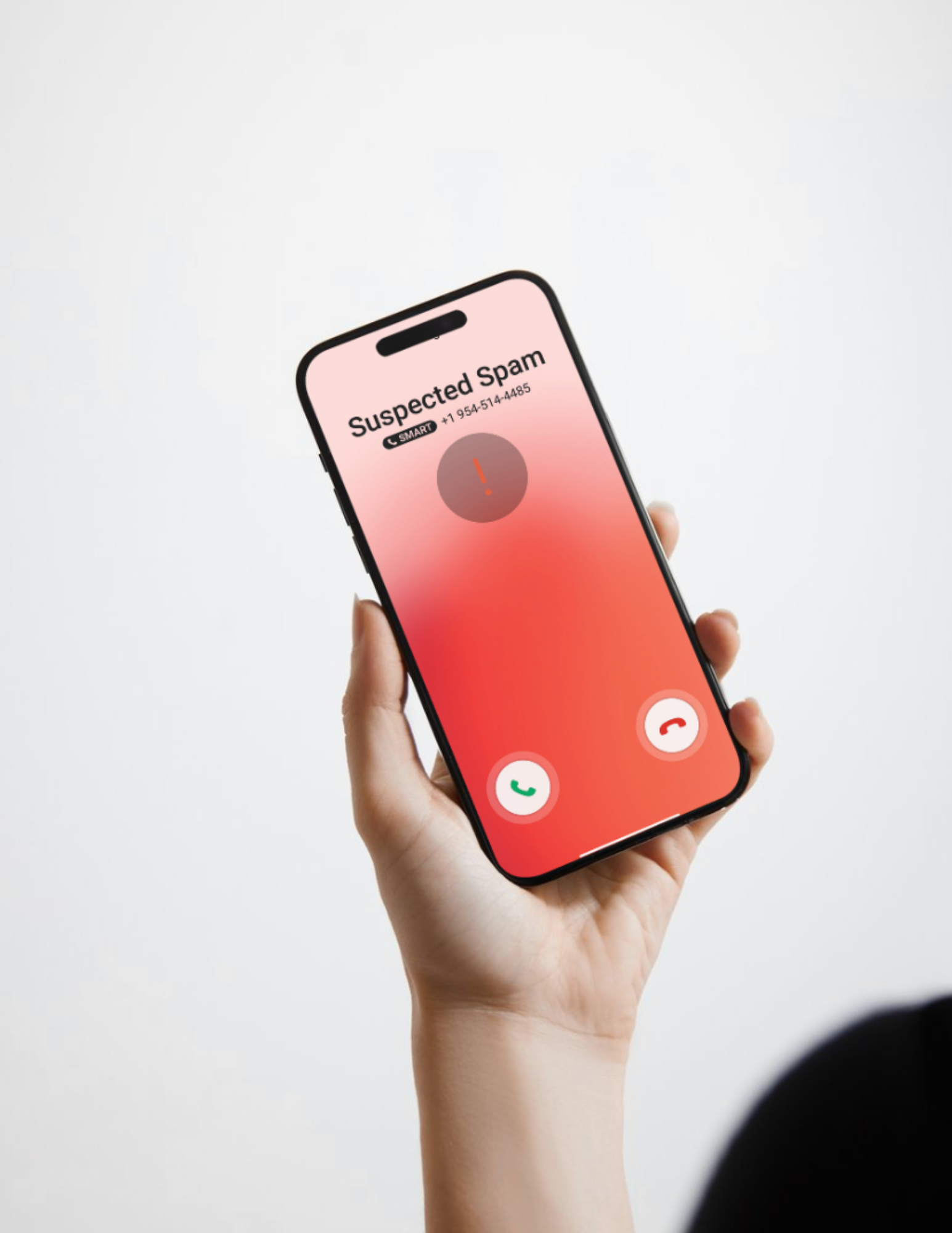 Image of a hand holding a smart phone device of a phone call ringing through as "Suspected Spam"